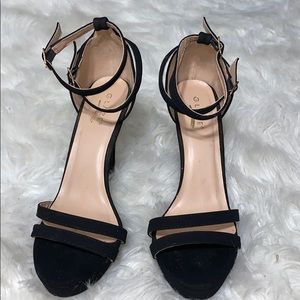 Black stiletto platform heels